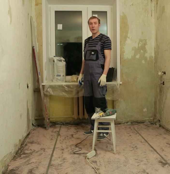Устанавливаем маяки для стяжки пола на пластиковые заглушки